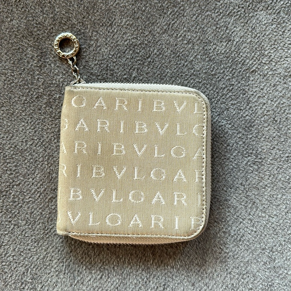 Bvlgari used zippy wallet.  Beige logo style.  Good condition!